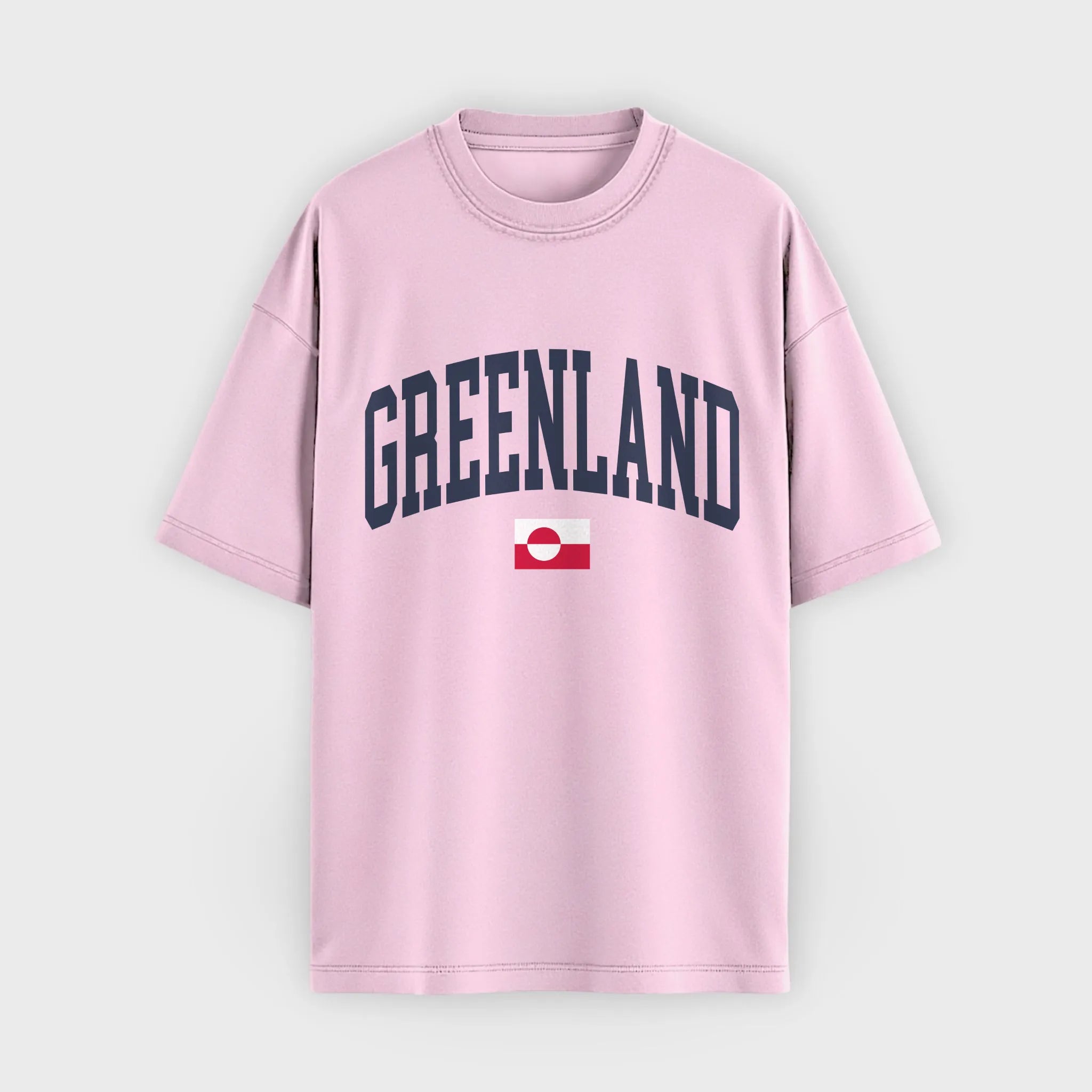Pink t-shirt with 'GREENLAND' text and a flag on a white background