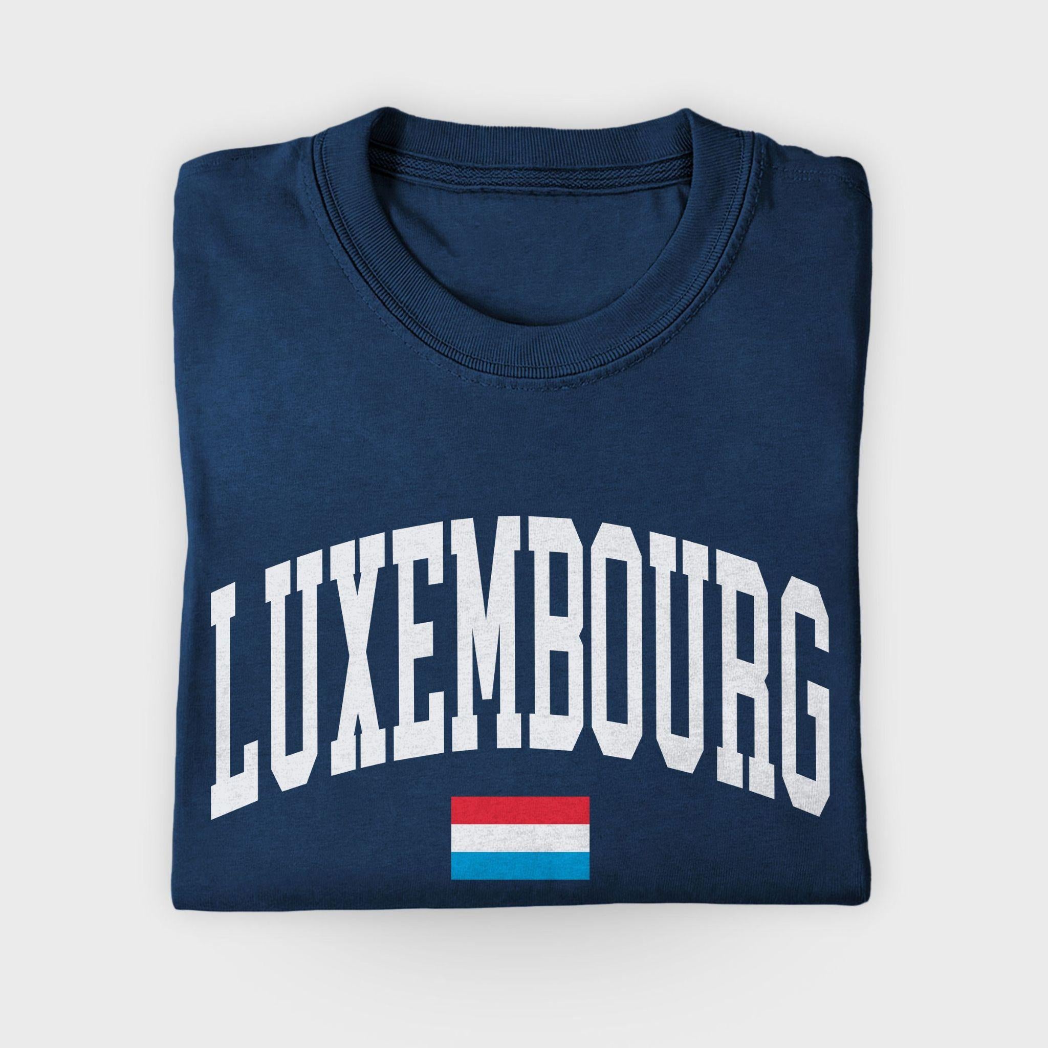Folded navy blue sweatshirt with 'Luxembourg' and Luxembourg flag design on a light gray background